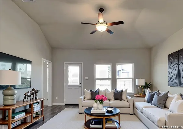a living room with furniture and window