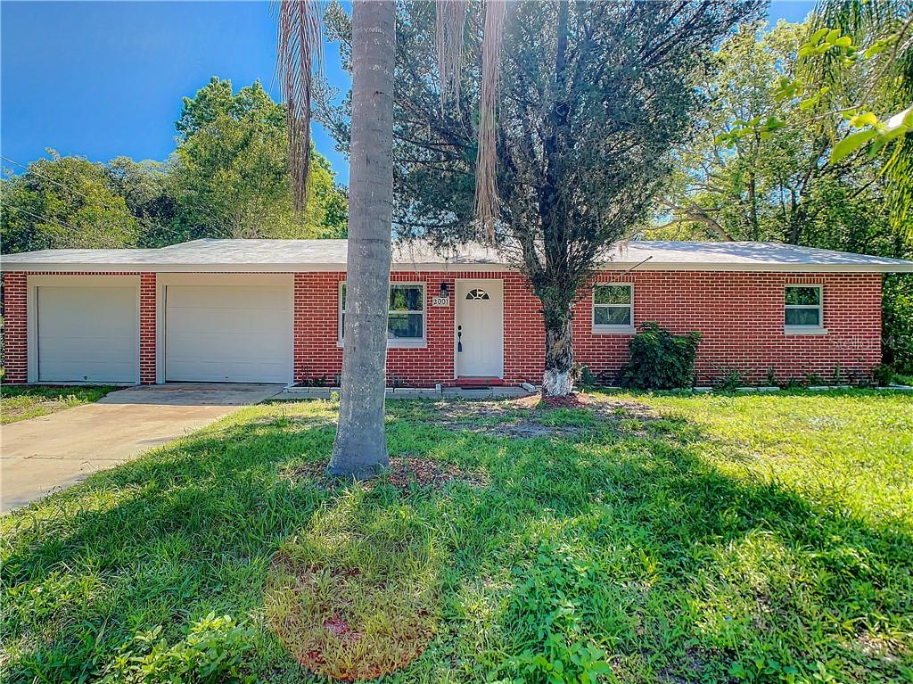 2001 Marsh Road DeLand, FL 32724 - Photo 1 of 1 front view of a house with a yard