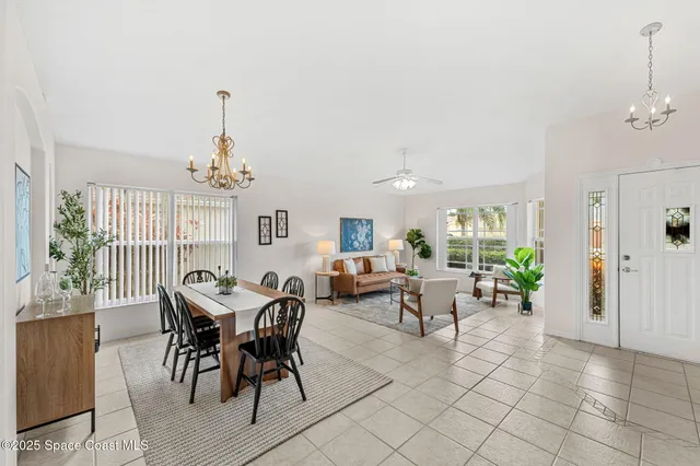 a view of a livingroom with furniture window and wooden floor