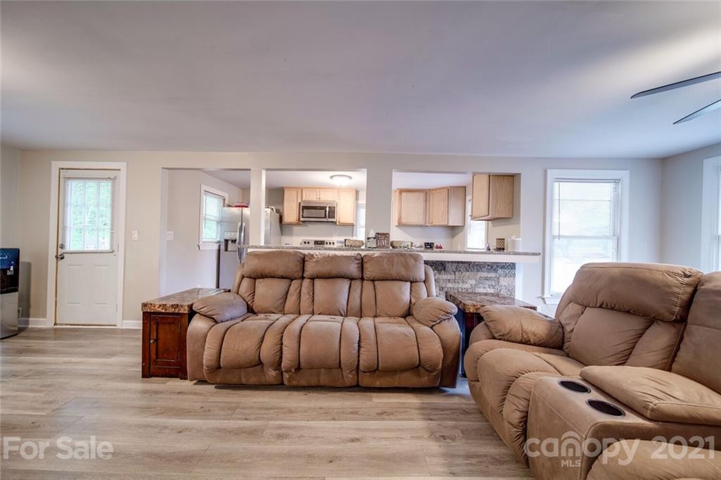 4414 Love Mill Road Monroe, NC 28110 - Photo 22 of 48 a large bedroom with a bed and window