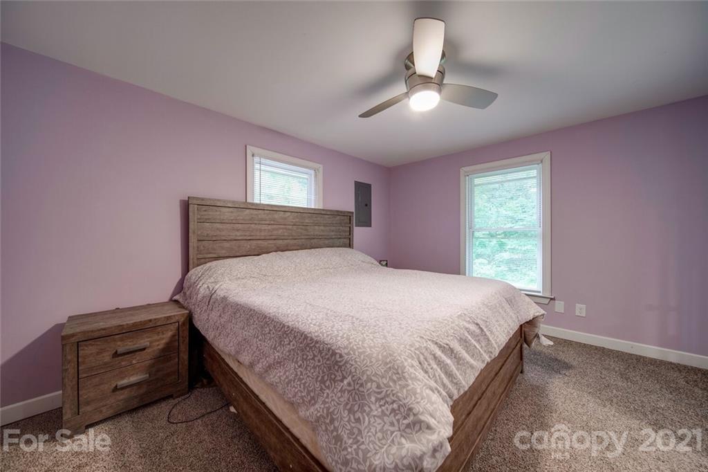 4414 Love Mill Road Monroe, NC 28110 - Photo 35 of 48 a bedroom with a bed and window