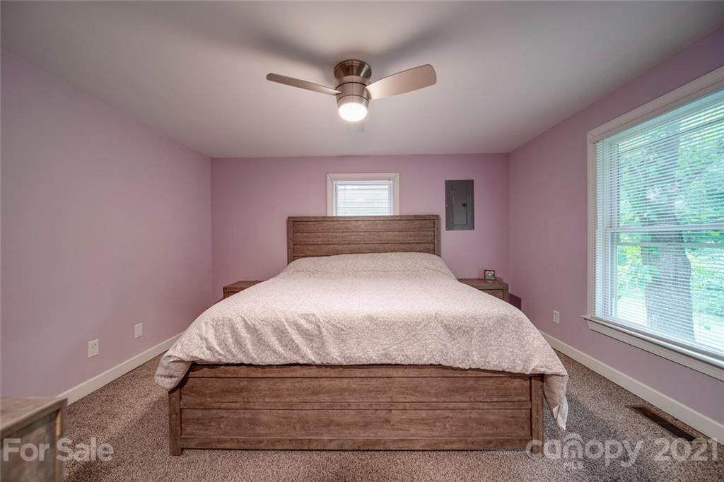 4414 Love Mill Road Monroe, NC 28110 - Photo 36 of 48 a bedroom with a bed and window