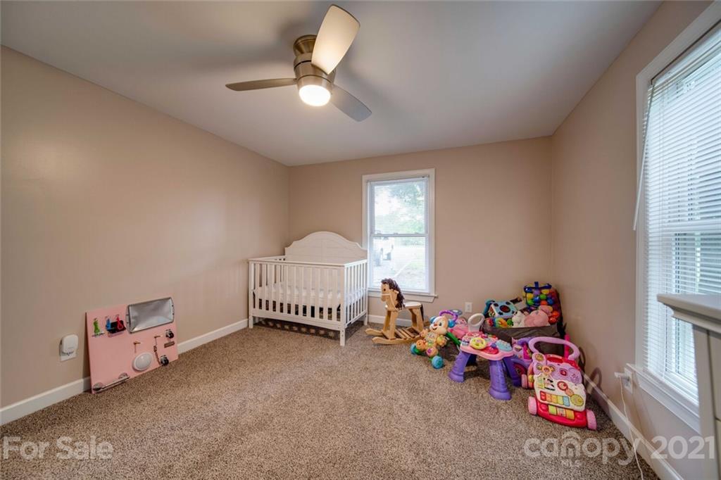 4414 Love Mill Road Monroe, NC 28110 - Photo 44 of 48 a bed room with a bed and a window