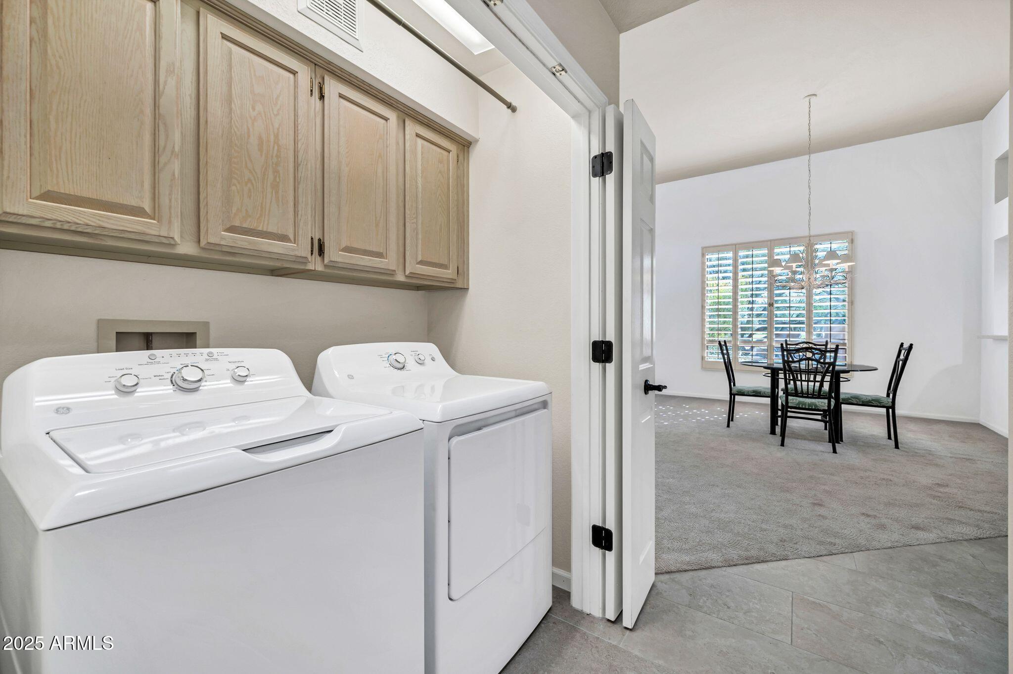 25515 Forest Road, Unit 13 Rio Verde, AZ 85263 - Photo 28 of 37 a utility room with dryer and washer