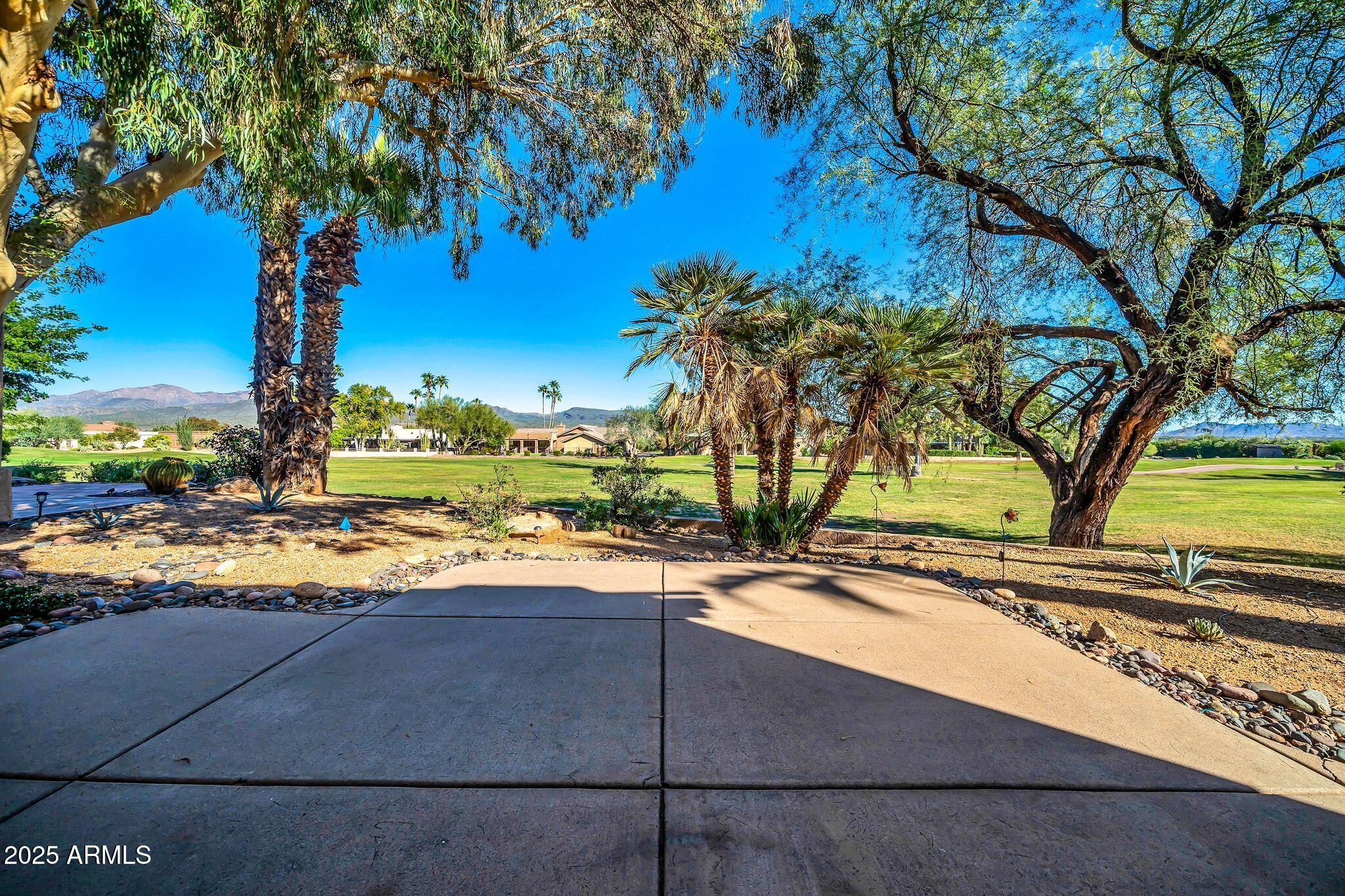 25515 Forest Road, Unit 13 Rio Verde, AZ 85263 - Photo 36 of 37 a view of a yard and car parked beside of it