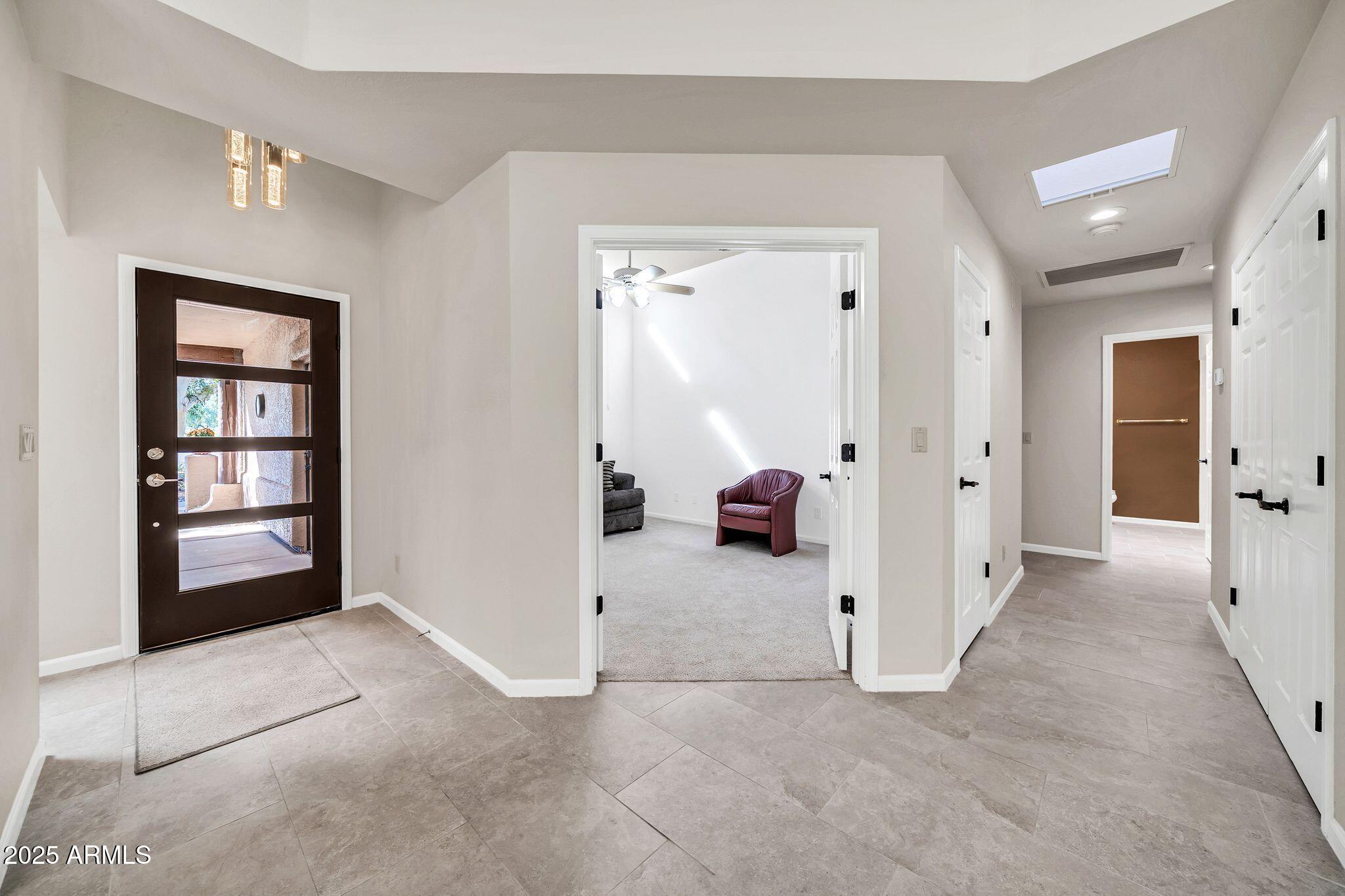 25515 Forest Road, Unit 13 Rio Verde, AZ 85263 - Photo 6 of 37 wooden floor and closet in a room