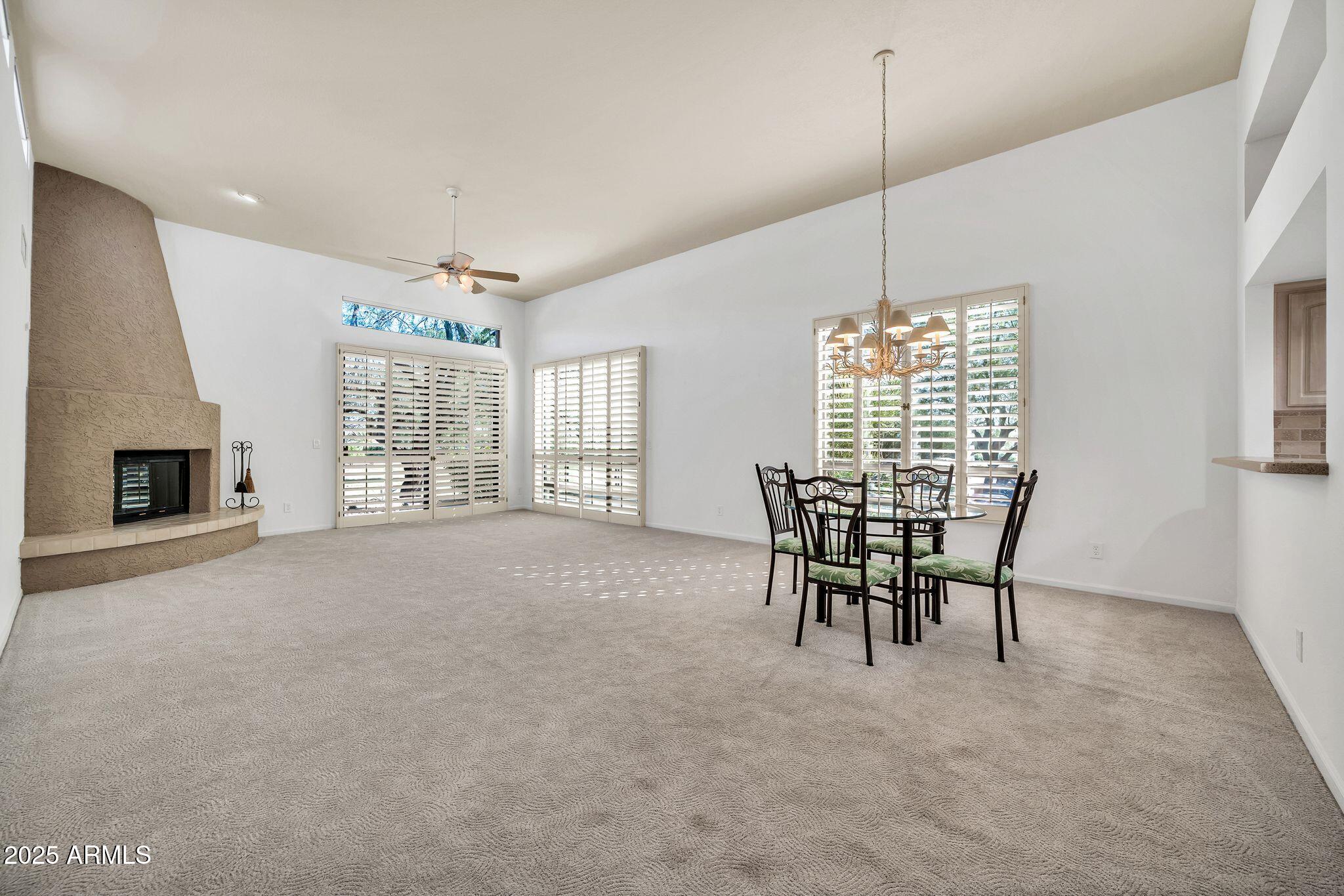 25515 Forest Road, Unit 13 Rio Verde, AZ 85263 - Photo 8 of 37 a dining room with furniture and window