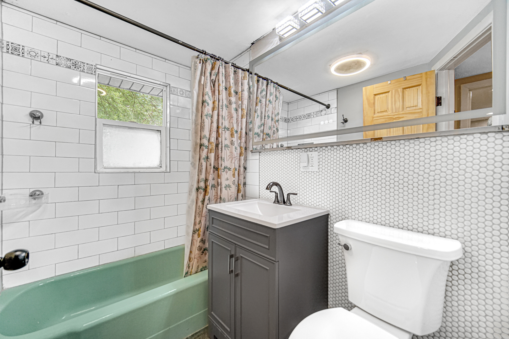 19150 Airport Road Romeoville, IL 60446 - Photo 12 of 14 a bathroom with a sink a toilet and shower