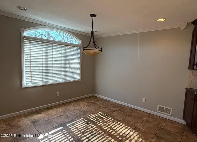 a view of a room with a window