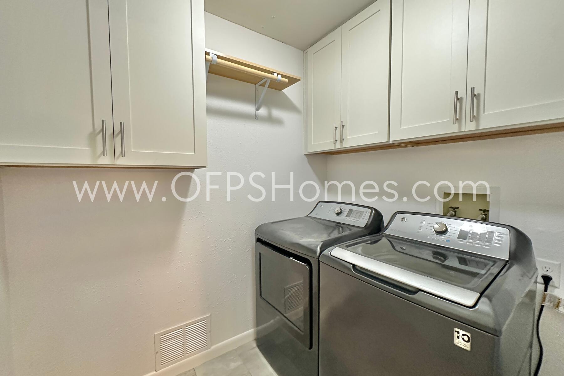 309 Pontevedra Lane Niceville, FL 32578 - Photo 17 of 32 a utility room with dryer and washer