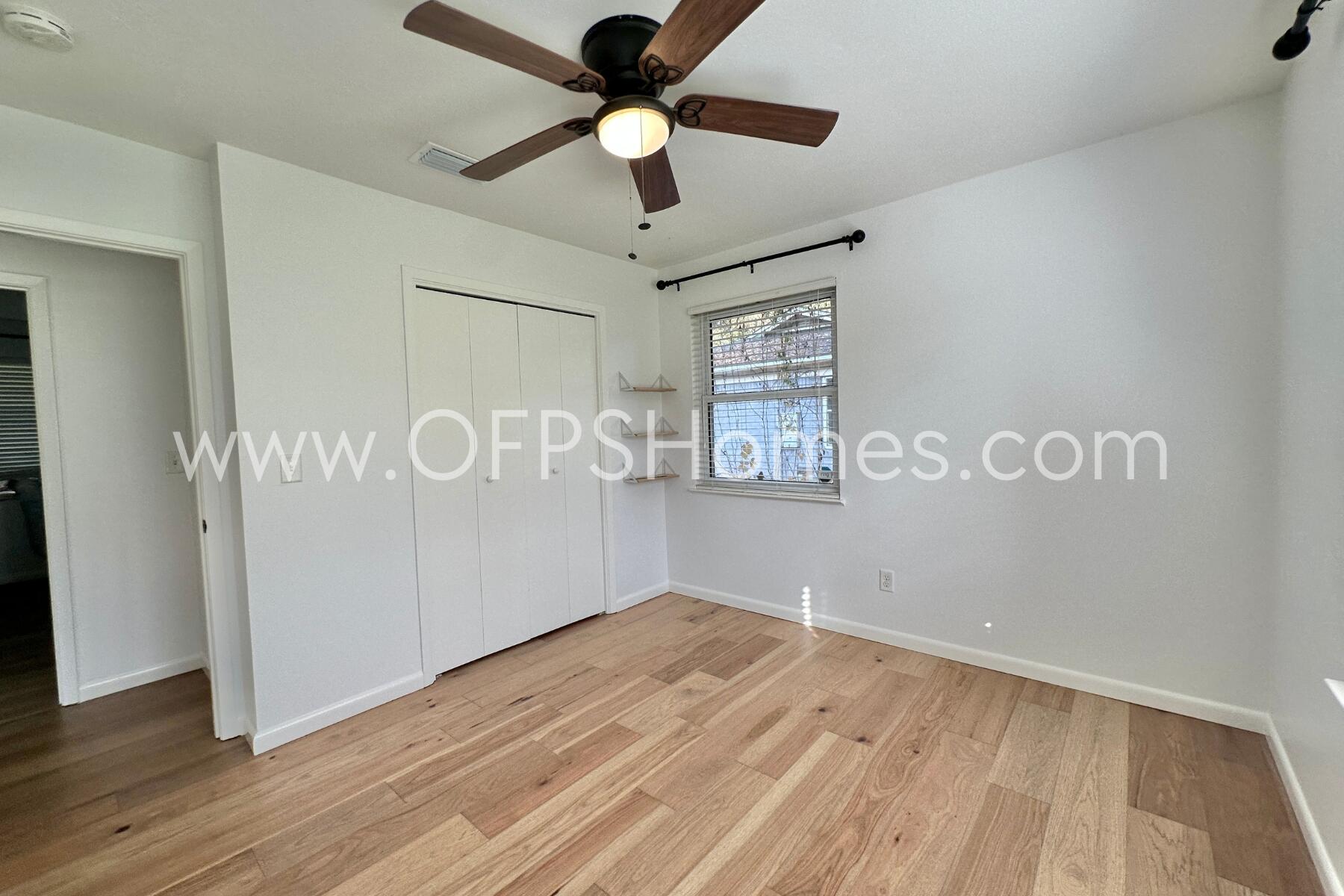 309 Pontevedra Lane Niceville, FL 32578 - Photo 23 of 32 a view of empty room with wooden floor