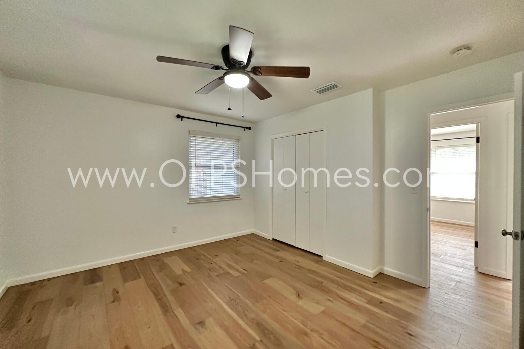 309 Pontevedra Lane Niceville, FL 32578 - Photo 26 of 32 a view of empty room with wooden floor