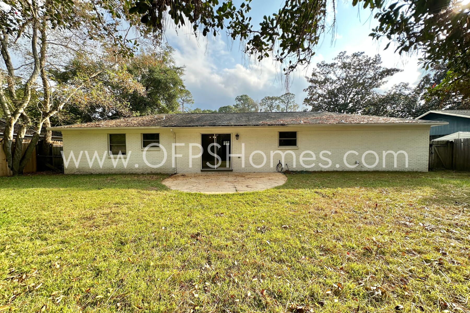 309 Pontevedra Lane Niceville, FL 32578 - Photo 32 of 32 a front view of a house with a garden