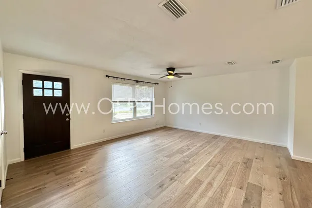 a view of an empty room and window