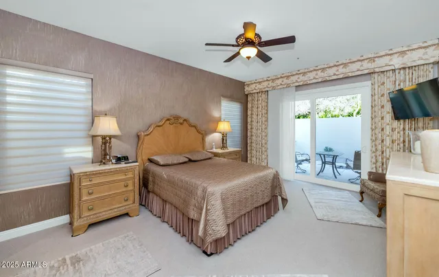 a spacious bathroom with a sink a mirror and a shower