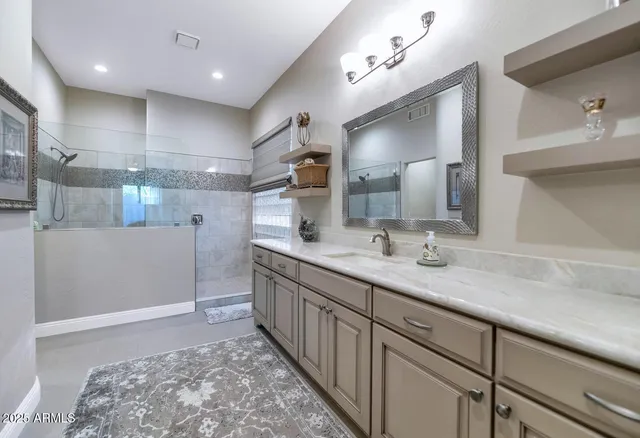 a bedroom with a bed and a closet