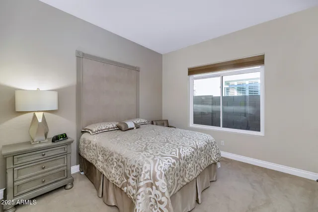 a view of a patio with table and chairs a barbeque with wooden fence