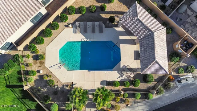 an aerial view of a city with mountains