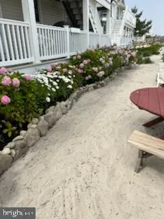 a aerial view of a house with a yard
