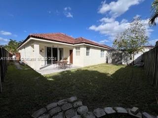 West Kendall Miami, FL 33193 - Photo 19 of 25 a front view of a house with garden