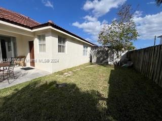 West Kendall Miami, FL 33193 - Photo 20 of 25 a front view of a house with garden
