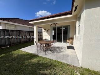 West Kendall Miami, FL 33193 - Photo 23 of 25 a view of a house with backyard and sitting area