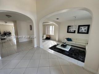 West Kendall Miami, FL 33193 - Photo 4 of 25 a living room with furniture and a view of kitchen