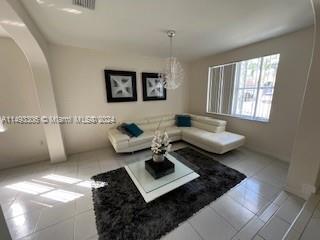 West Kendall Miami, FL 33193 - Photo 6 of 25 a living room with furniture and a rug