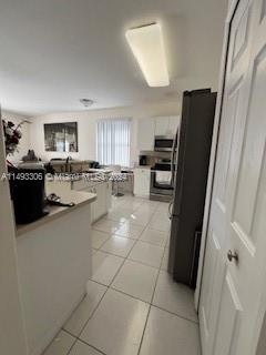 West Kendall Miami, FL 33193 - Photo 10 of 25 a kitchen with a refrigerator and a stove