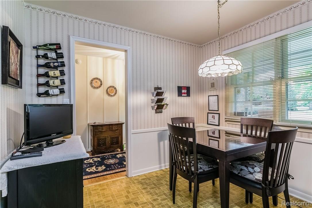 Looking from the kitchen to the breakfast nook and foyer/entry