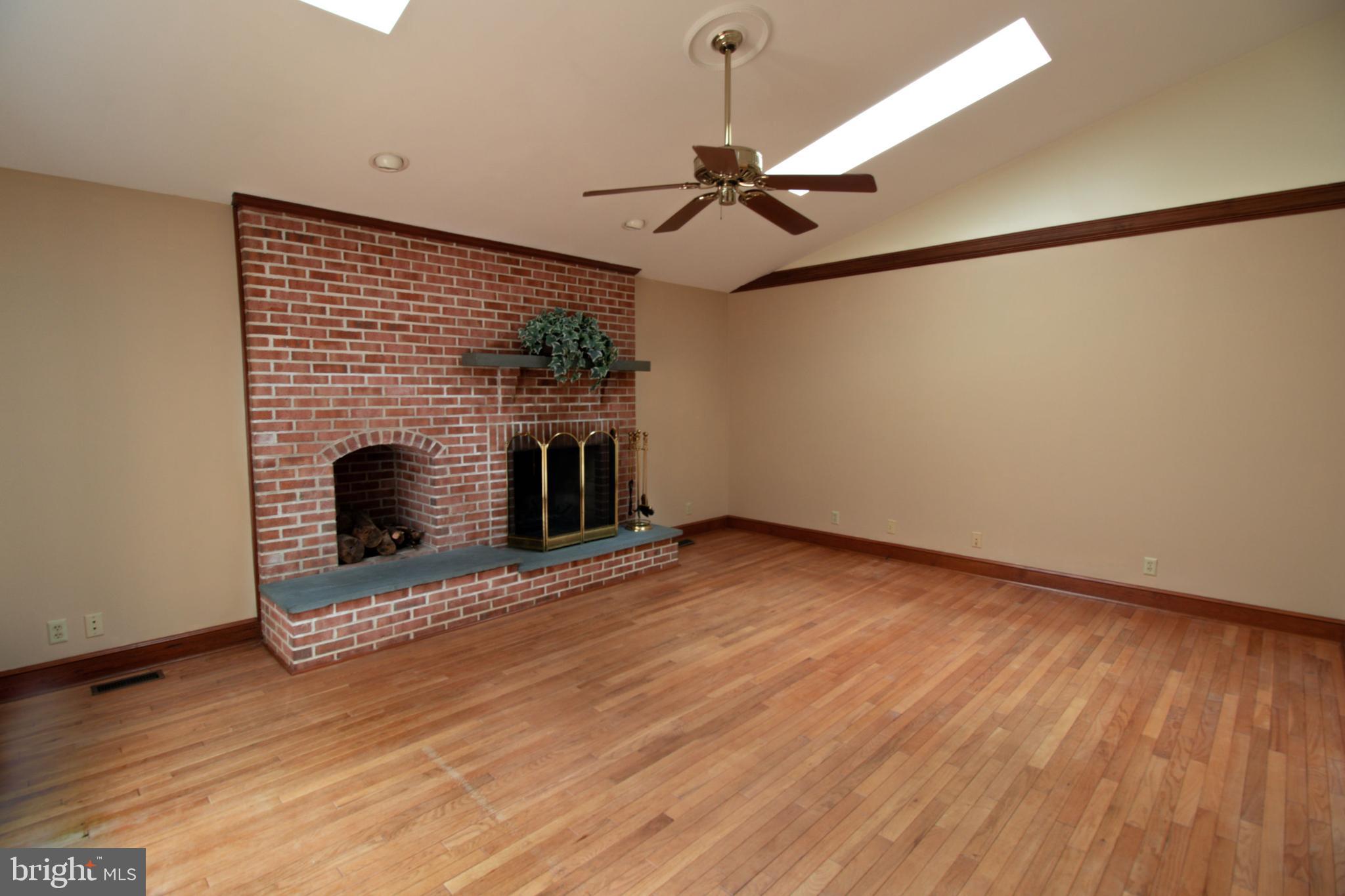 7782 Poplar Grove Road Severn, MD 21144 - Photo 11 of 52 Raised hearth, brick & Bluestone