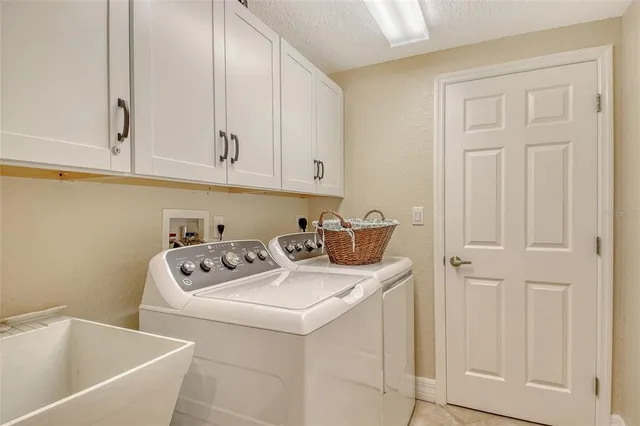 a view of a lake with boats and a patio