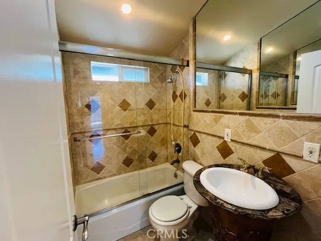 a lobby with furniture and a large window