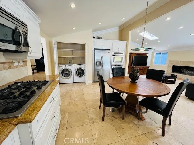 a view of a kitchen with a sink