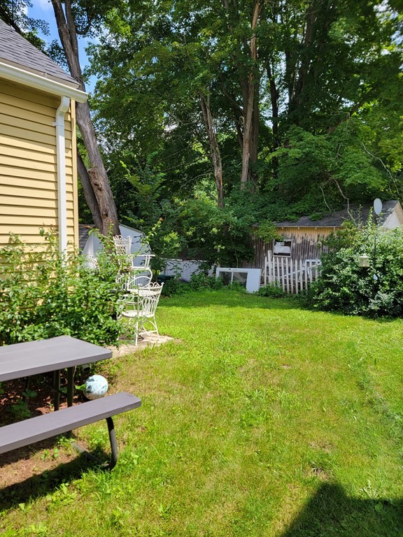 45 Maple Street Warren, MA 01083 - Photo 20 of 20 a view of a chair and table in the backyard