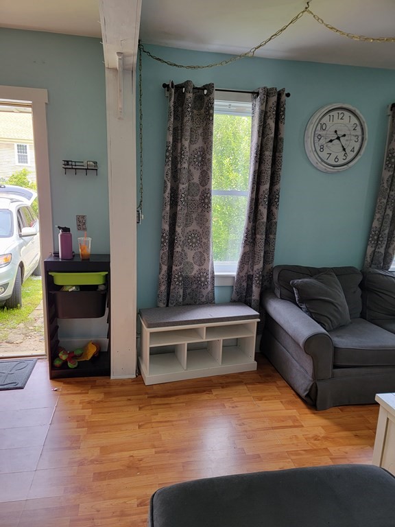 45 Maple Street Warren, MA 01083 - Photo 5 of 20 a living room with furniture and a window