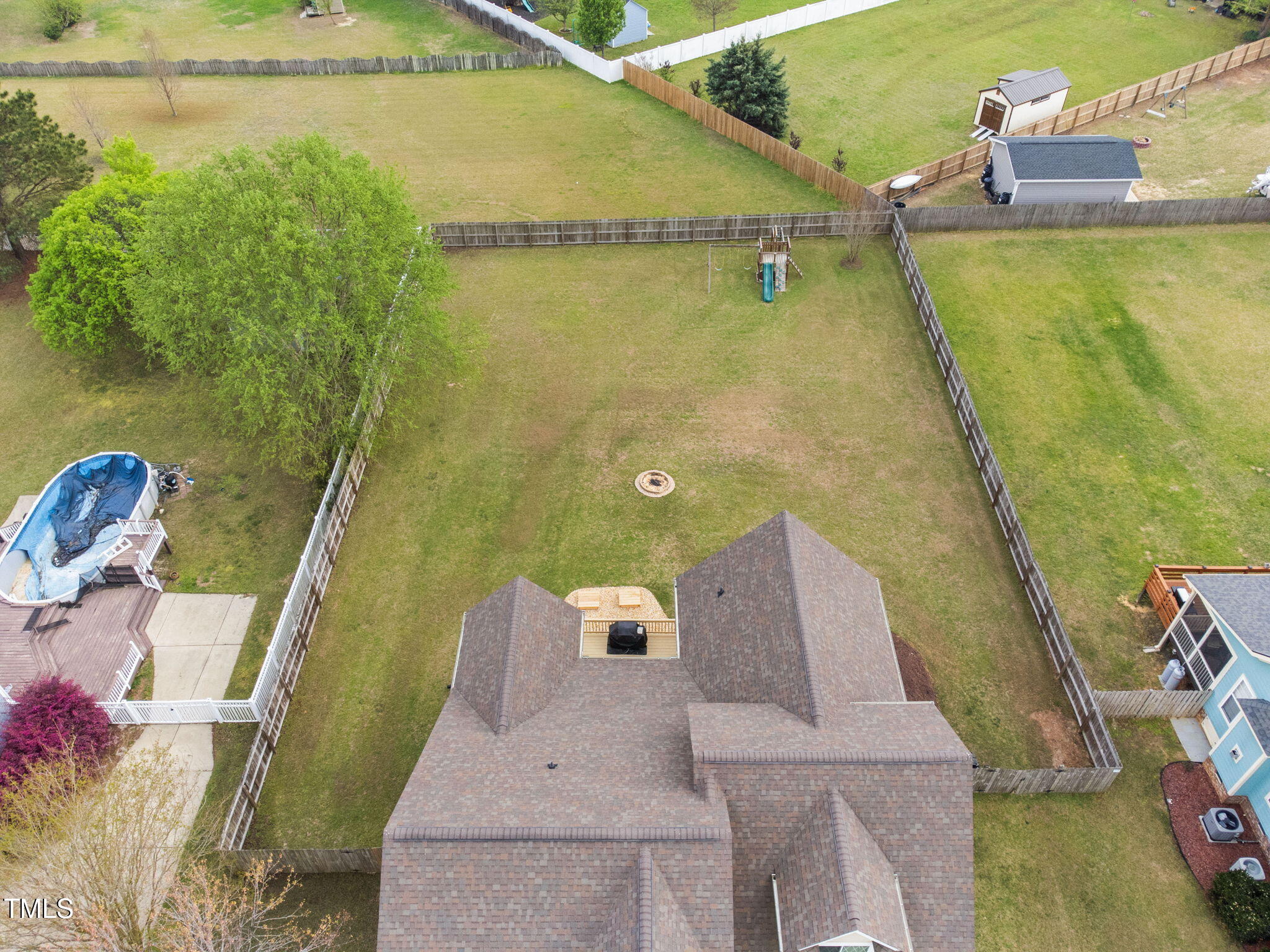 2113 Conroy Way Willow Spring, NC 27592 - Photo 3 of 38 roof and backyard