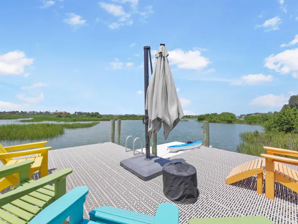 a spacious bedroom with a bed and a window