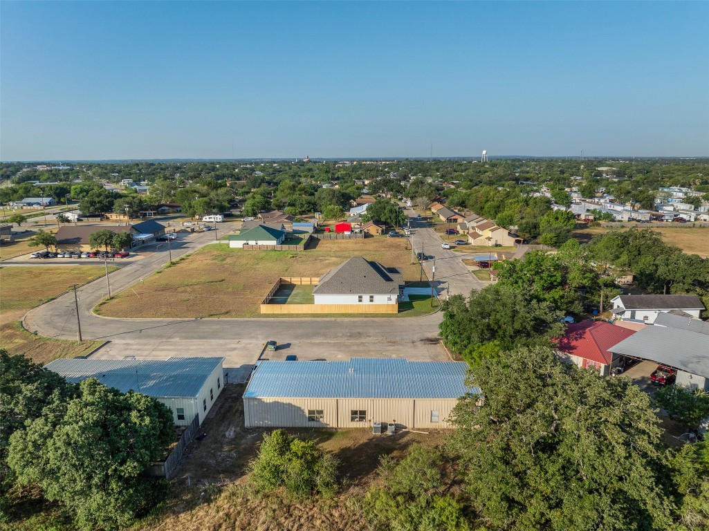 340 Cactus Street Giddings, TX 78942 - Photo 32 of 37 Aerial perspective of suburban area