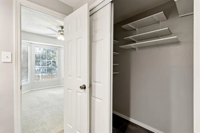 a bathroom with a glass shower door