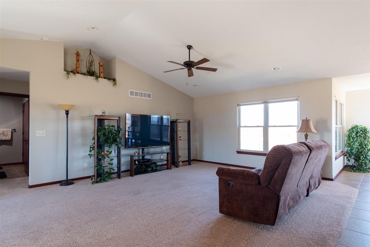 6350 Blomberg Road Cherry Valley, IL 61016 - Photo 3 of 25 a living room with furniture and a window