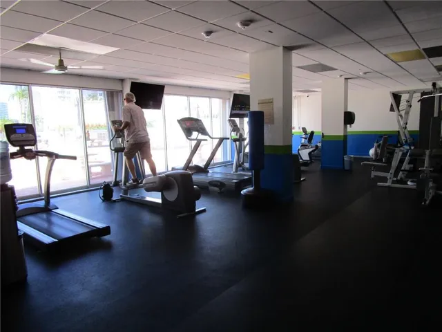 a gym room with gym equipment