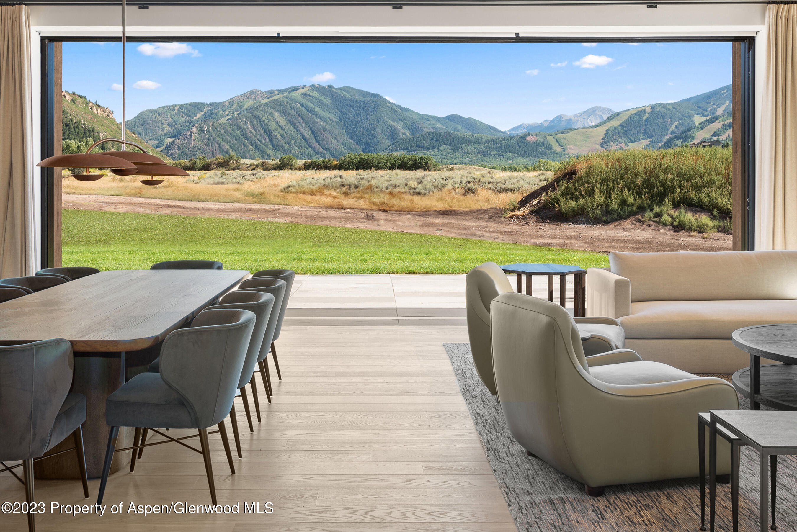 245 Slalom Path Aspen, CO 81612 - Photo 4 of 34 a view of a chairs and table in patio