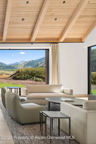 a living room with a couch and a table