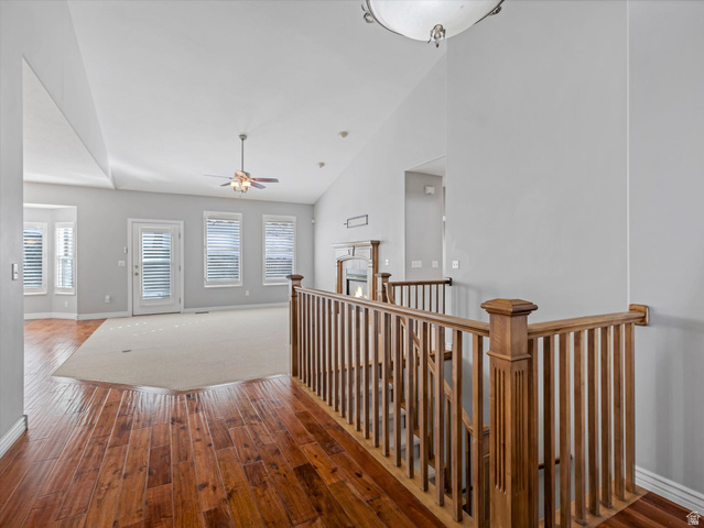 352 Haven Crest Road Draper, UT 84020 - Photo 9 of 44 Entrance Hardwood flooring and wood banister detailing