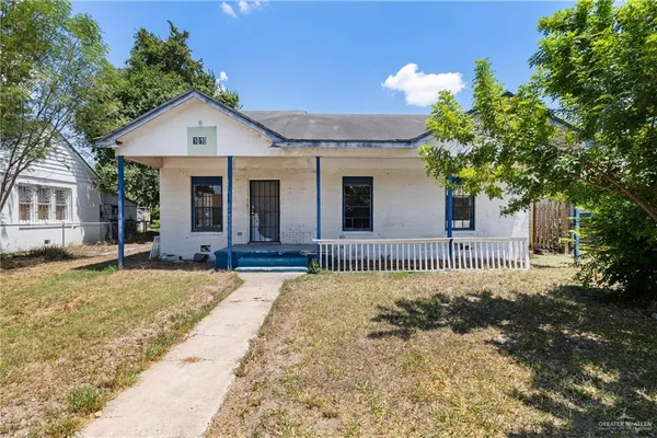 a front view of a house with a porch