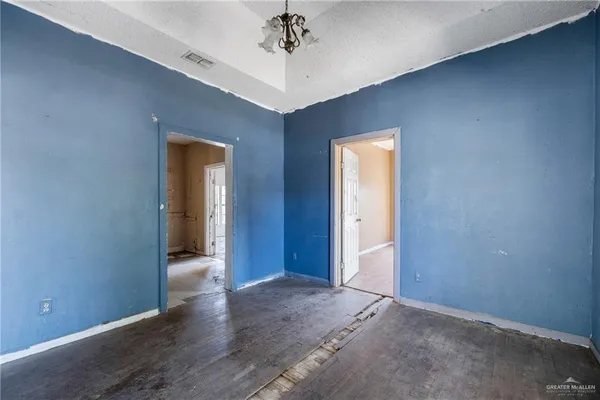 an empty room with windows