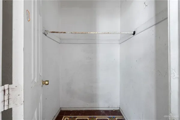 a view of a livingroom with a kitchen