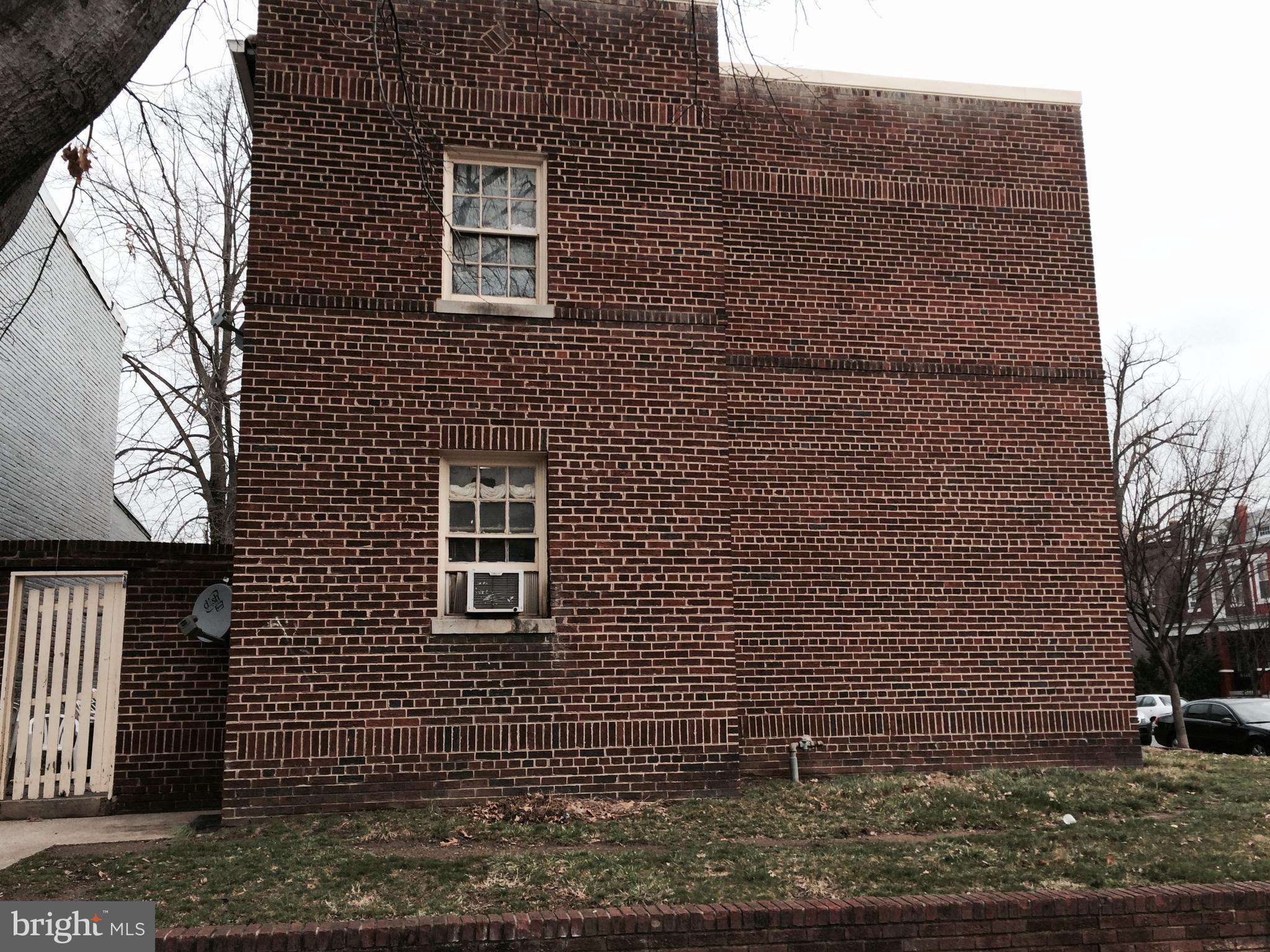 900 5th Street Northeast Washington, DC 20002 - Photo 2 of 2 a brick building with a door