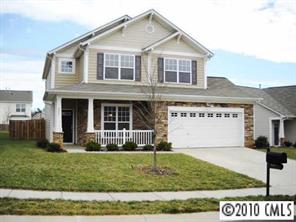 285 Sand Paver Way Fort Mill, SC 29708 - Photo 1 of 8 a front view of a house with a yard